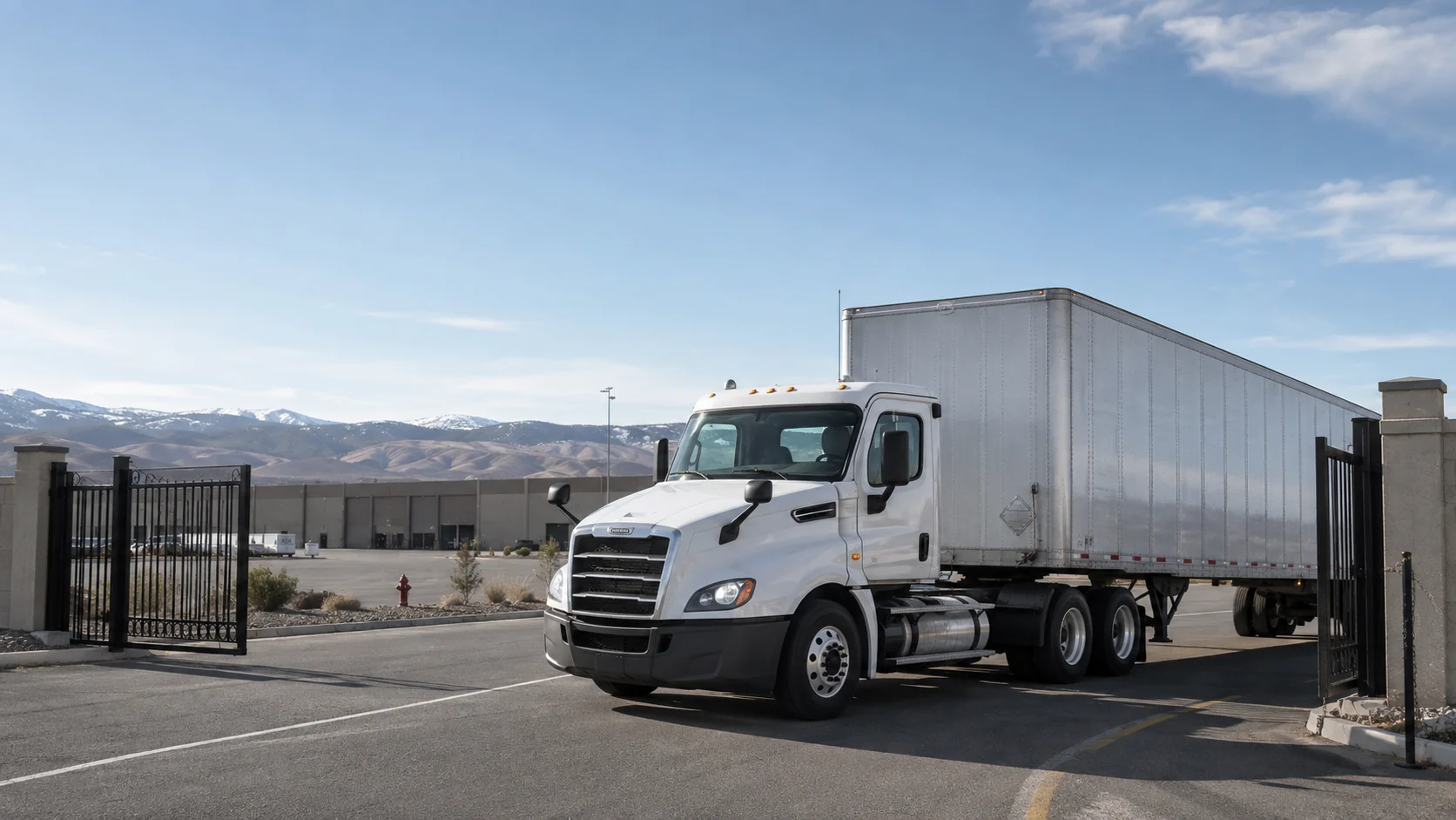 Unbranded tractor-trailer entering a Reno-area industrial yard